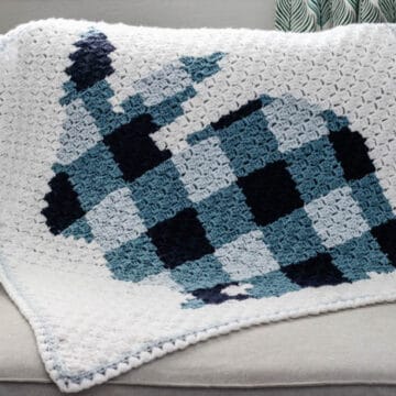 Plaid corner to corner crochet bunny rabbit blanket pattern with a pom pom tail. Free pattern using Lion Brand Vanna's Choice yarn.