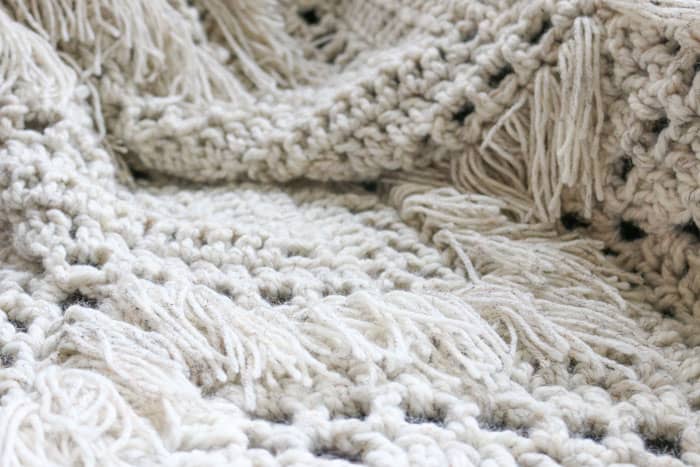Lion Brand Wool-Ease Thick & Quick makes the perfect yarn for this chunky crochet ripple afghan pattern. Get the free pattern for the Sedona Throw from Make and Do Crew.