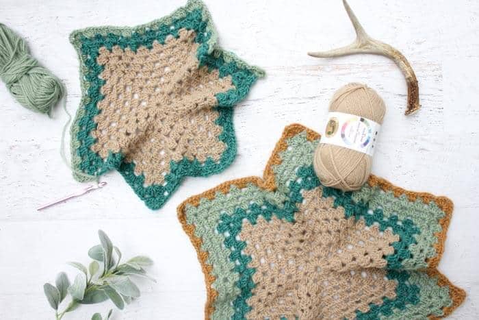 Believe it or not, two simple granny hexagons are the foundation of this free crochet hexagon sweater pattern. "The Campfire Cardigan" is made with Lion Brand New Basic 175 in Juniper, Cafe Au Lait, Thyme and Camel. 